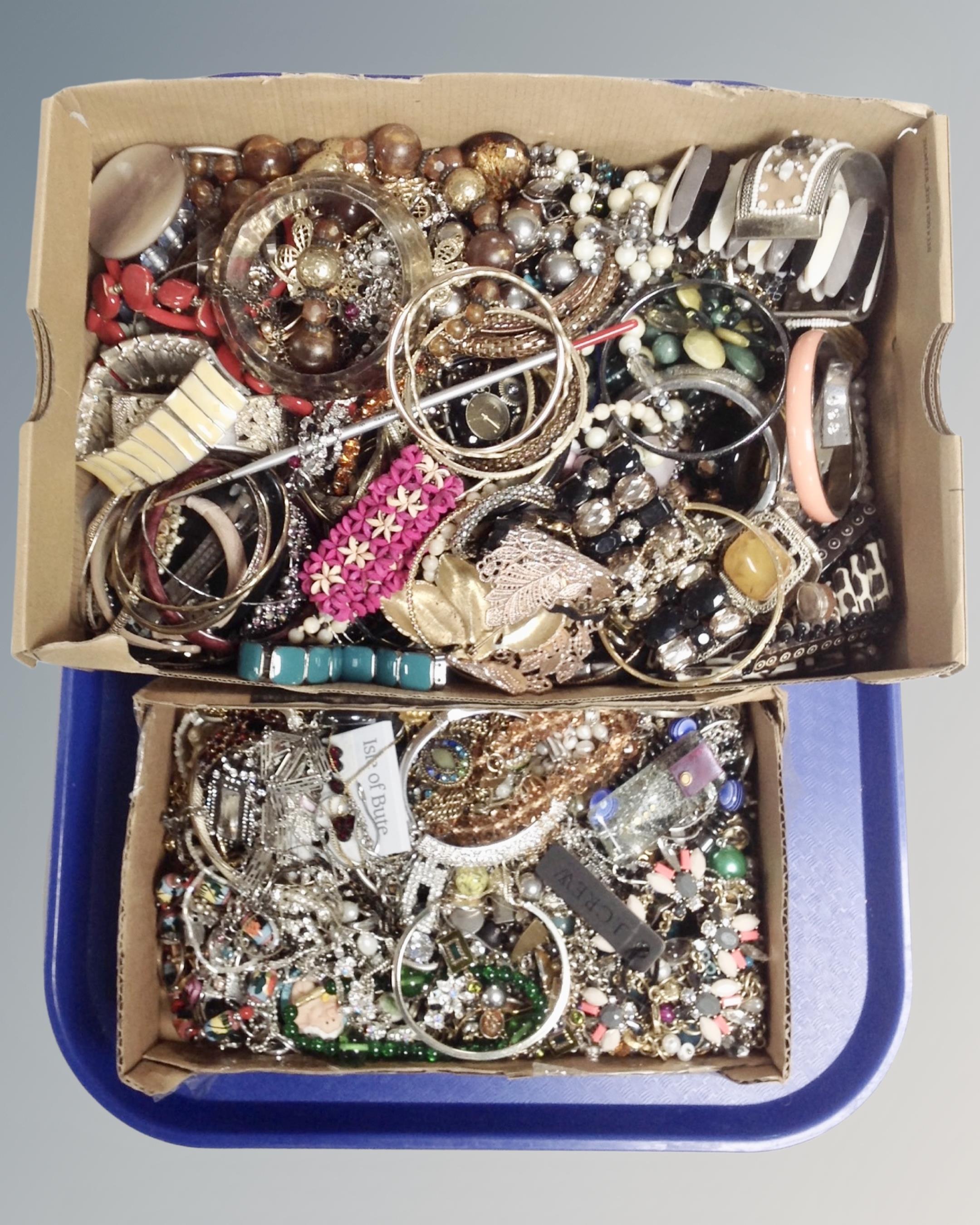 A box of silver, white and yellow metal jewellery and Murano glass beaded jewellery.