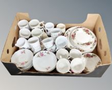 A box containing ironstone pottery, English Rose tea and dinner china, Chinese rose pattern tea set,