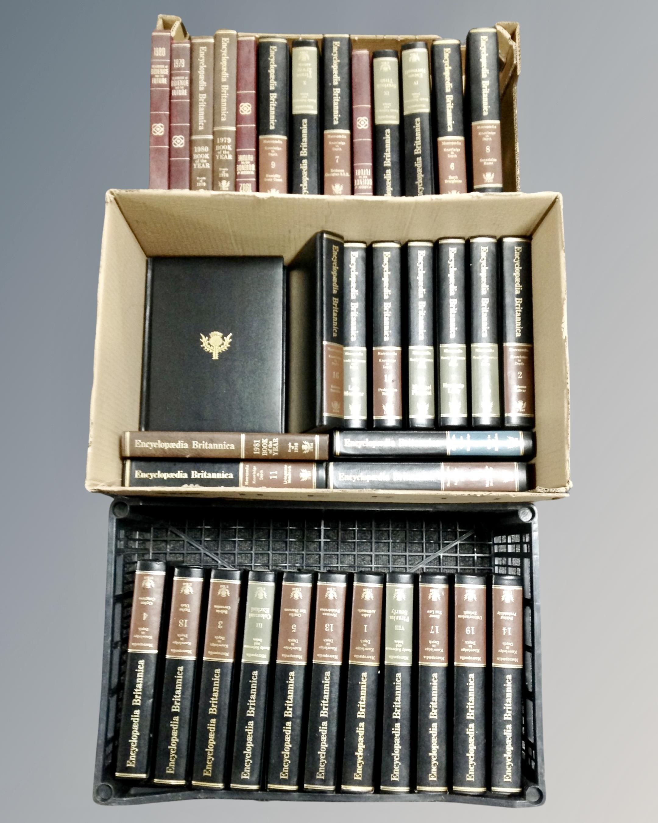 Two boxes and a crate containing Encyclopedia Britannica,