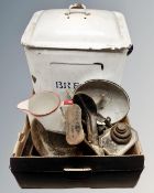 A box containing an enamelled bread bin, antique cast iron cobbler's last,