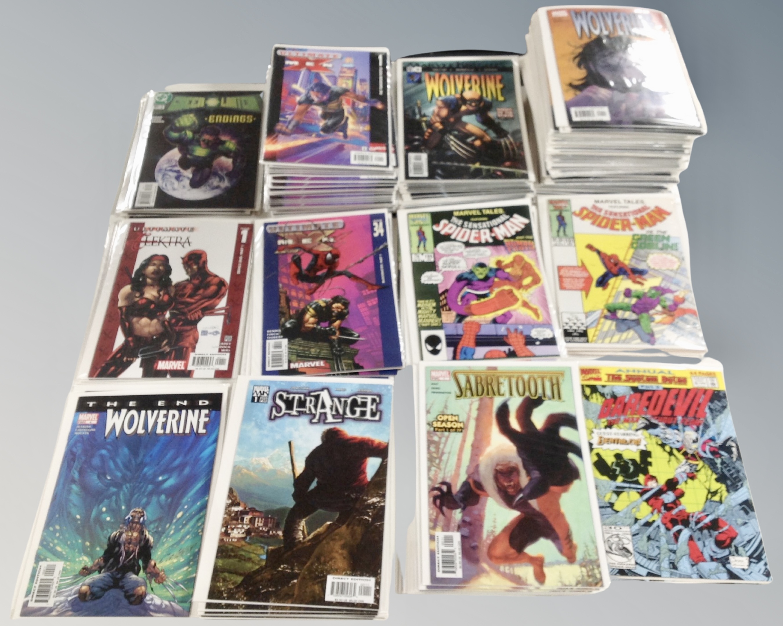 A box of Marvel comics to include Green Lantern, Wolverine, Sensational Spider-Man, Daredevil,