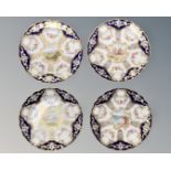 Four Royal Worcester hand painted and gilded cabinet plates,