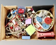 A crate containing a large quantity of costume jewellery, lady's handbags, jewellery boxes etc.