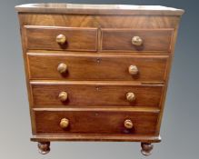 A Victorian mahogany and pine two-over-three chest of drawers.