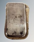 A silver card case, Chester 1921, presented to J. E.