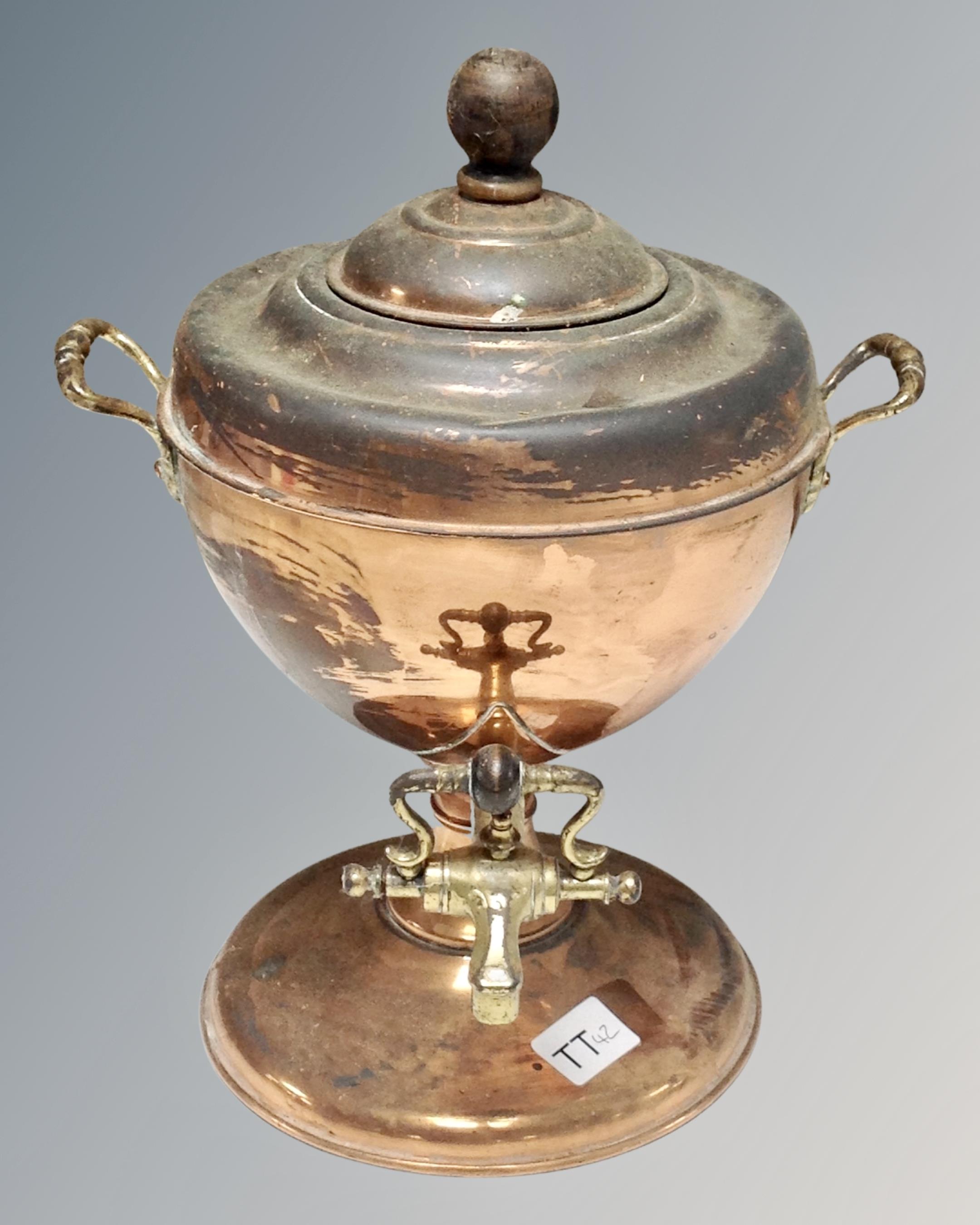 A Victorian copper urn.