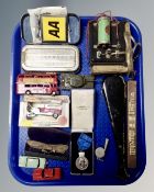 A tray containing die cast vehicles, a Gustaf VI Adolf coronation medal, AA badge, whistle,