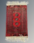 A Bokhara rug, Afghanistan, 50cm by 80cm.