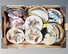 A box containing a quantity of assorted collector's plates including Royal Doulton, RAF,