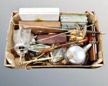 A box of miscellany to include first aid kit, gent's travel set, pair of ornamental fencing swords,