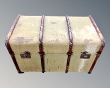 An early 20th century canvas bentwood bound shipping trunk.