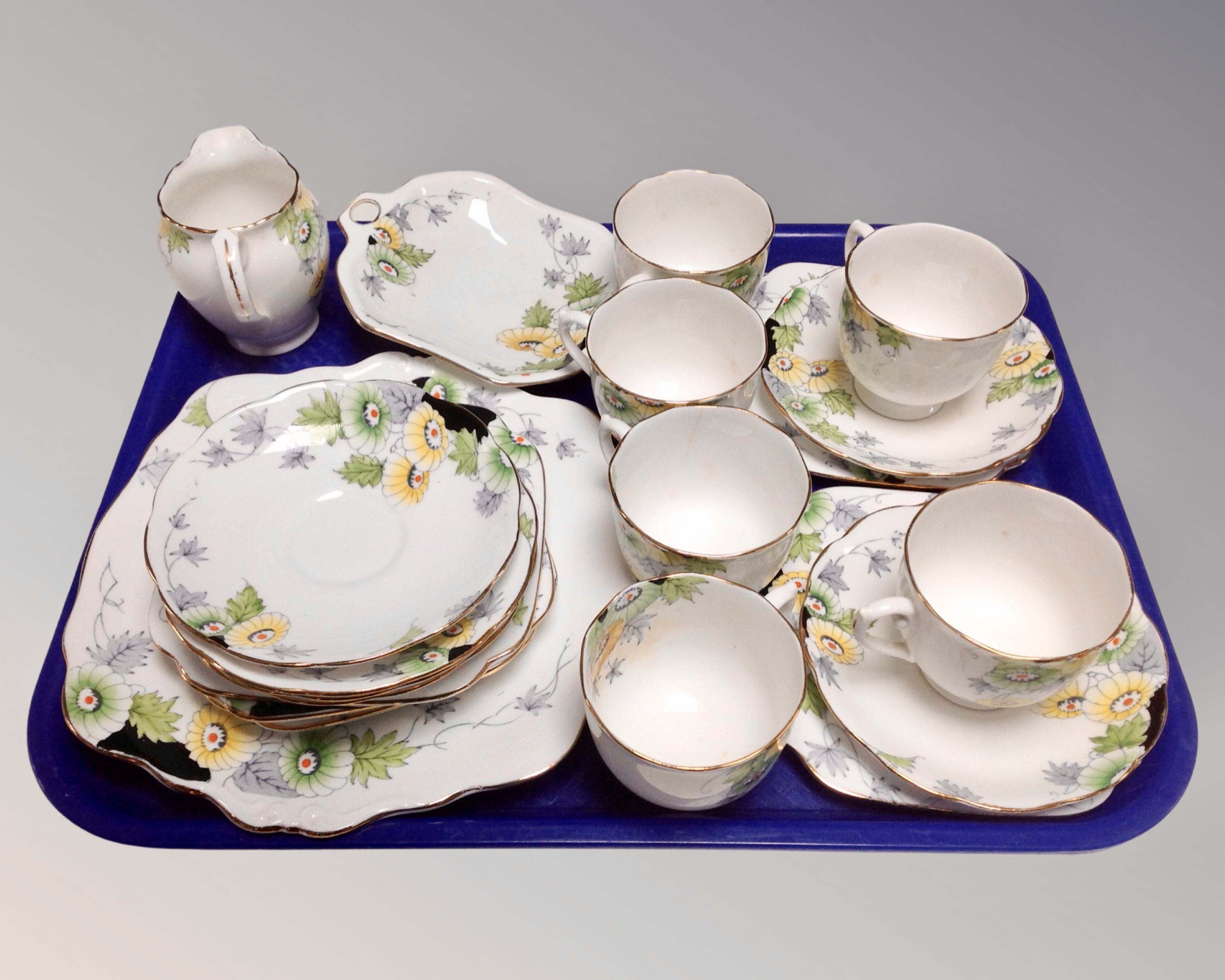 A twenty-one piece Roslyn china Marigold bone china tea service