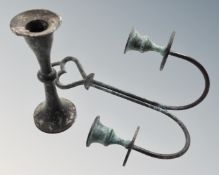 An antique bronze candlestick together with two-way wall sconce