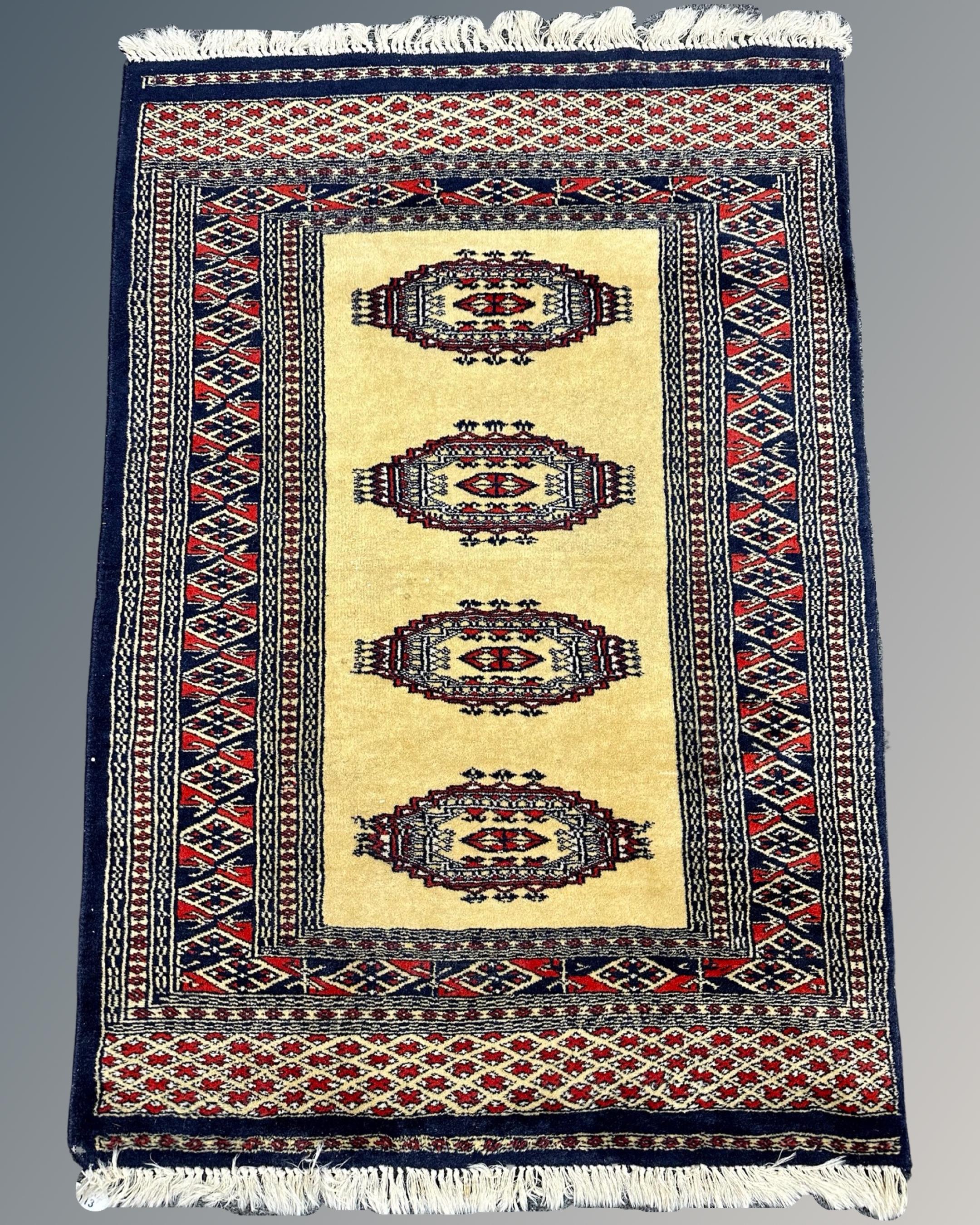 A Lahore Bokhara rug, Pakistan, 78cm by 114cm.