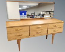 A 20th century Austin Suite six drawer dressing table on raised legs together with a blanket box