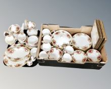 A box containing a quantity of Royal Albert Old Country Roses tea and dinner china together with