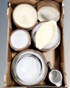 A box containing a quantity of Denby dinnerware.