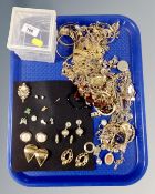 A tray containing a large quantity of gilt-tone costume jewellery.
