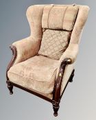 A contemporary Victorian style wingback armchair.