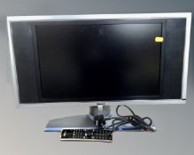 A Dell LCD monitor with lead and remote