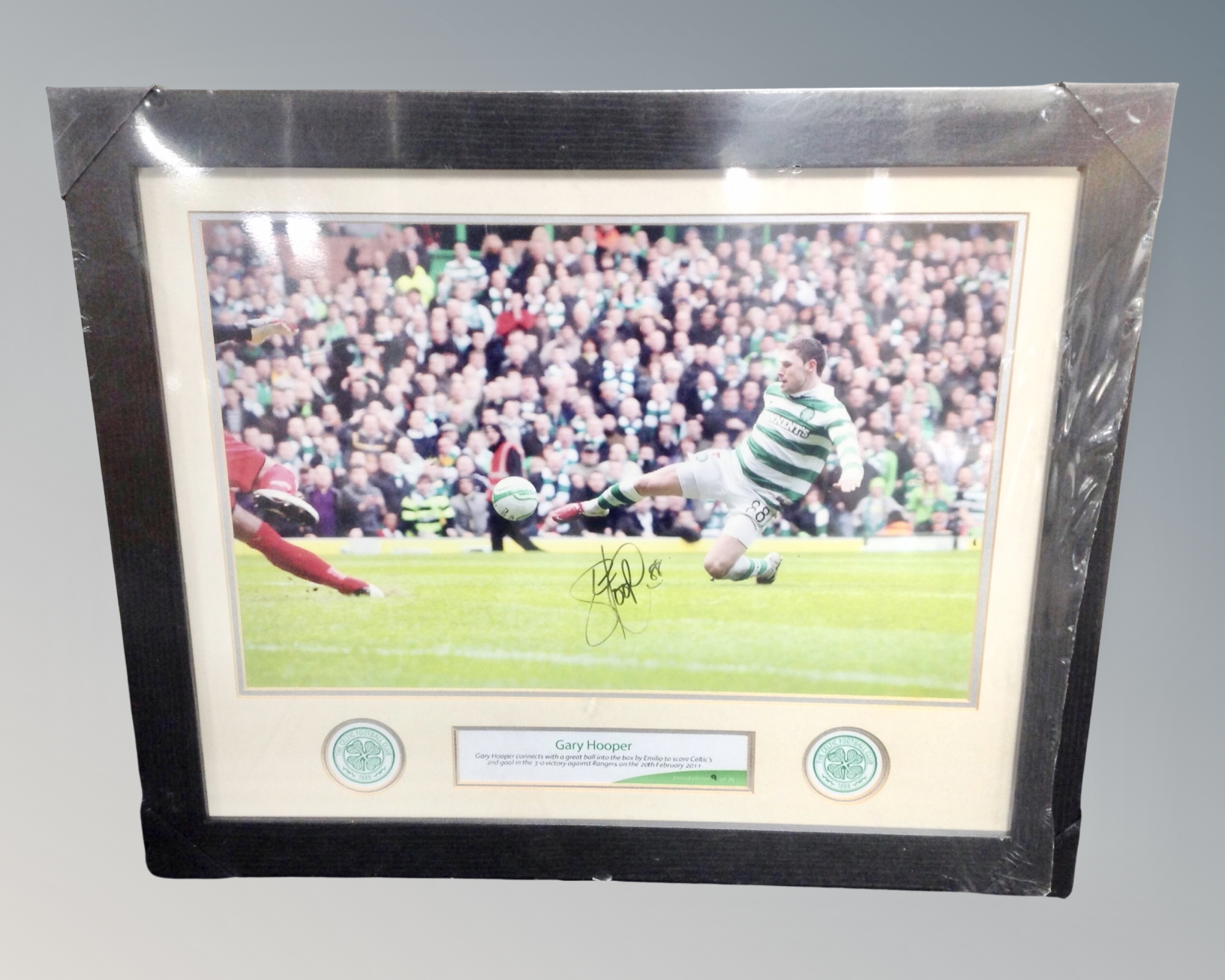 A Gary Hooper Celtic signed limited edition photograph depicting the second goal in the three-nil