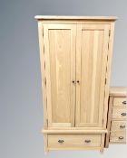 A three Barker & Stonehouse contemporary oak bedroom suite comprising a pair of double door hanging