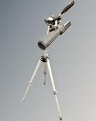 A Tasco 3711 spotting scope on tripod stand
