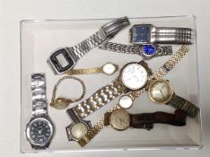 A tray containing ten assorted lady's and gent's wristwatches including Lorus, Casio etc.