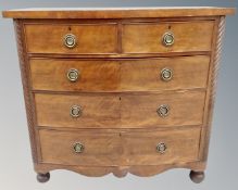 A Victorian mahogany two over three bow fronted five drawer chest.