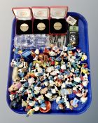 A tray of vintage plastic figures including Smurfs, E.T.