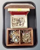 A tray of costume jewellery, brooches, heavy gilt necklaces, cameo brooch,