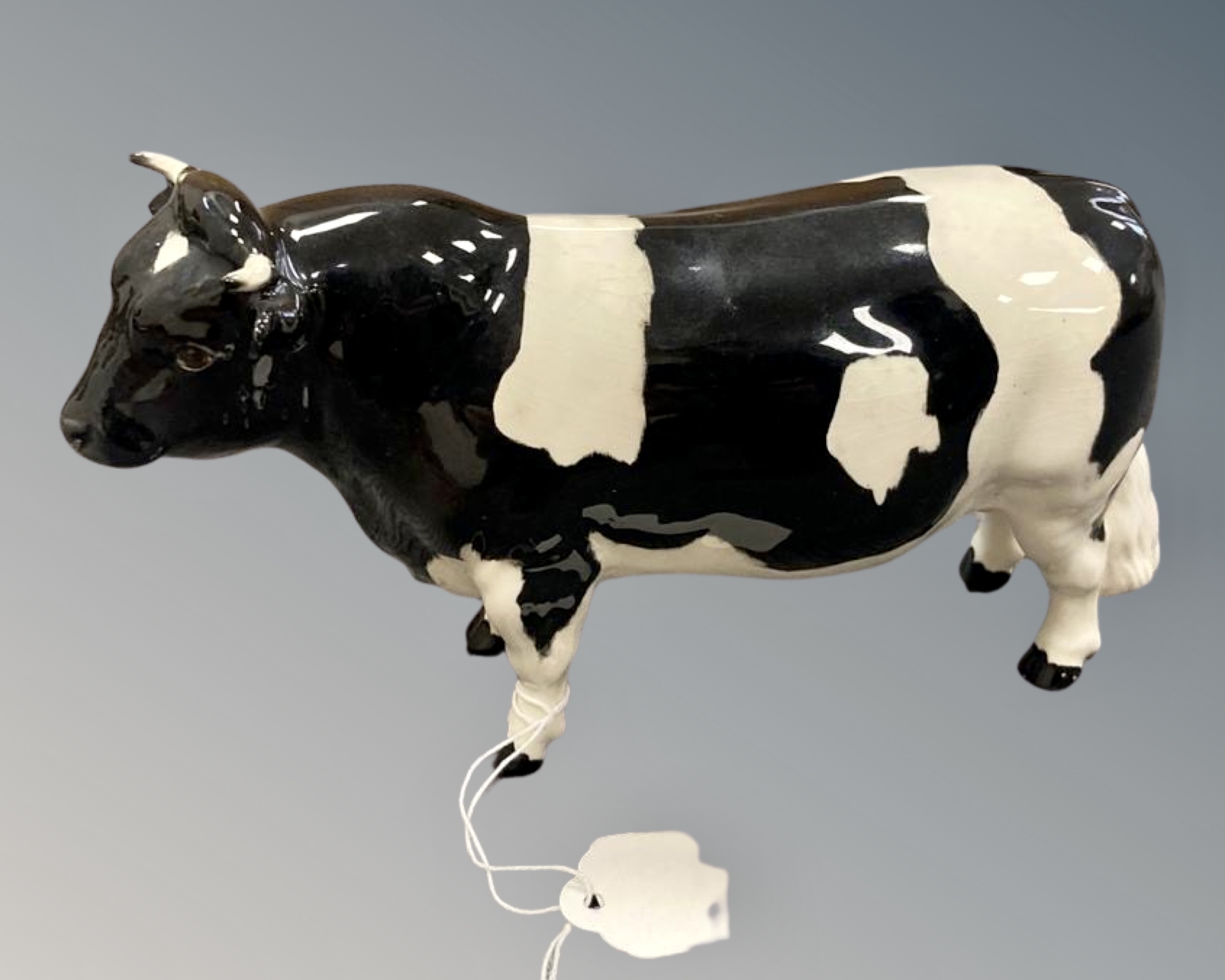 A Beswick bull ' Champion Coddington Hilt Bar', height 11.5 cm.