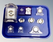 A tray of nine crystal desk and mantel clocks including Edinburgh Crystal, Royal Albert,