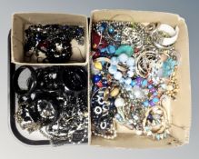 A box of costume jewellery together with a small box of mourning jewellery including French jet.