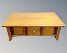 A good quality contemporary storage coffee table with cantilever top,