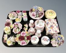 A tray of assorted ceramics to include china flower posies, Carlton ware lidded preserve pot,