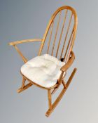 An Ercol elm and beech rocking chair.