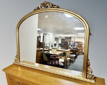 A Victorian style arch topped overmantel mirror,