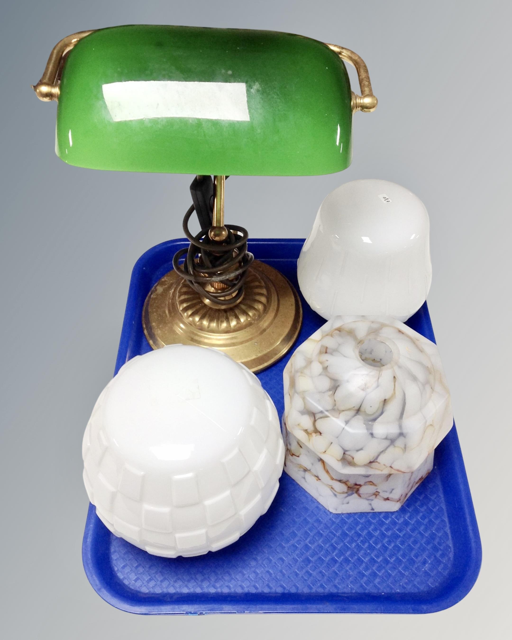 A tray of three Art Deco light shades together with a banker's desk lamp