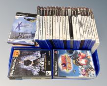A tray of PlayStation 2 games