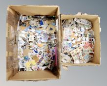 Two boxes of a large quantity of loose stamps