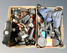 Two boxes of assorted camera bags, vintage cameras, cine camera,
