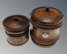 Two Edwardian oak wooden tea caddies,