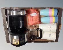 A box of Russell Hobbs coffee maker, metal tea and coffee cans, filters,