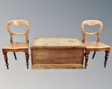 A pair of Victorian mahogany dining chairs together with a pine and plywood blanket box.