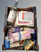 A dress maker's dummy torso together with two boxes of vintage tins and packaging,