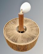 A 1970s pendant light fitting with shade.