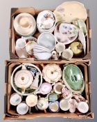 Two boxes containing assorted ceramics including tea ware, bowls, commemorative china, teapots etc.