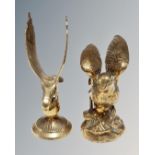 Two brass bird ornaments, an eagle and a pigeon.