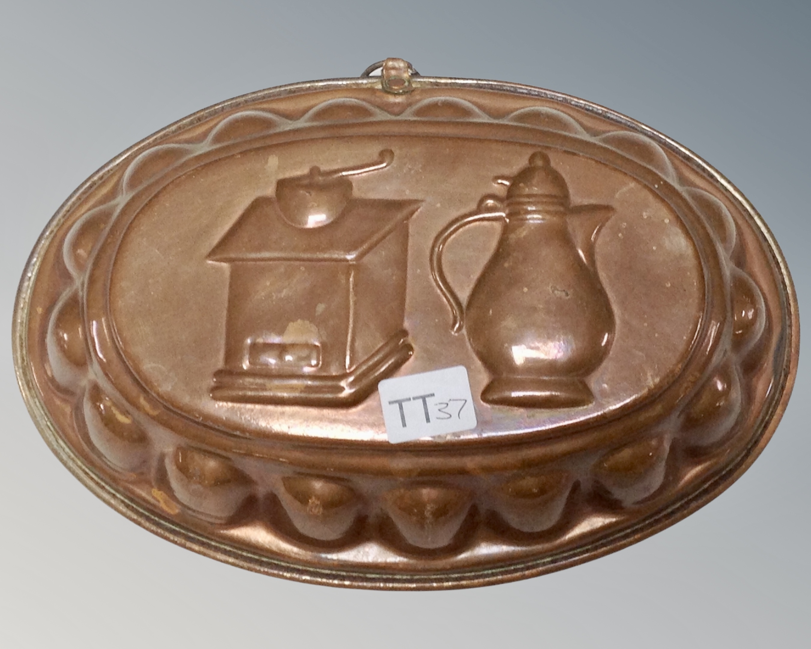 A Victorian copper jelly mould.